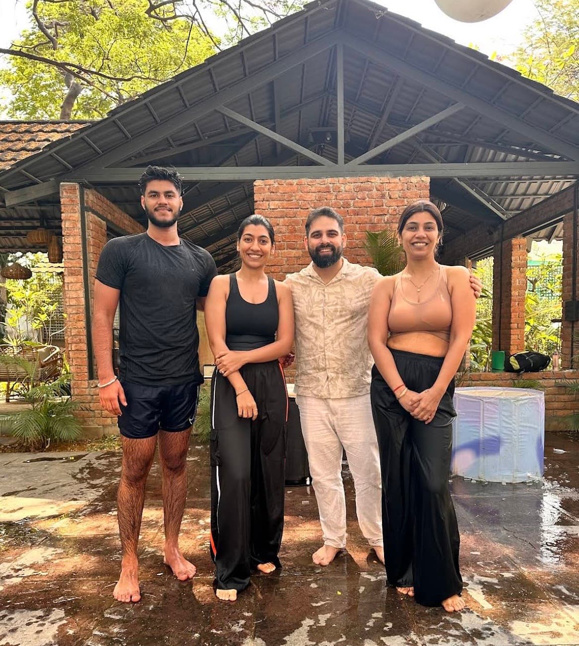 Group standing together in an open-air wellness space